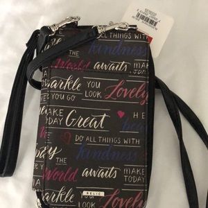 Crossbody or wristlet phone purse license credit cards etc.